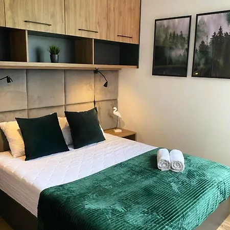Holiday home Cisza Village / Blisko Natury Nowecin