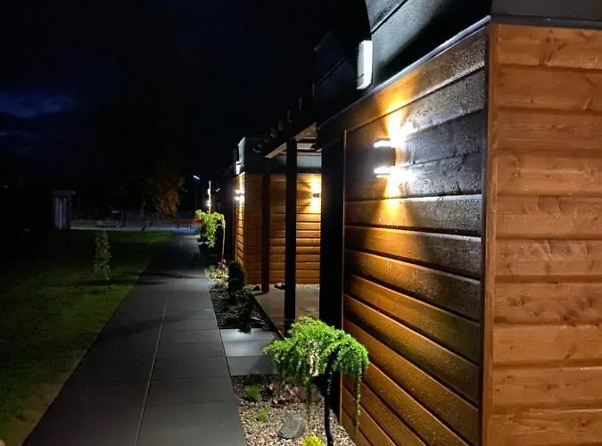 別荘 Cisza Village / Blisko Natury Nowecin