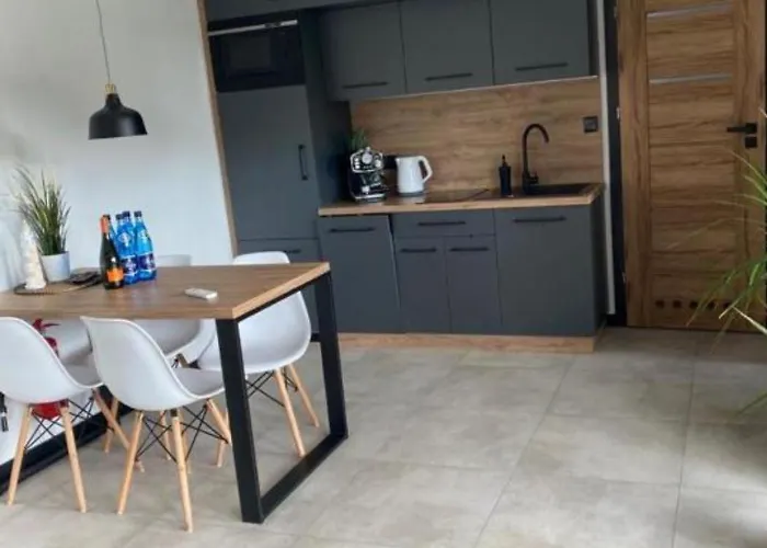 別荘 Cisza Village / Blisko Natury Nowecin