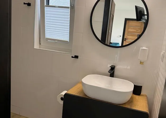 Feriehus Cisza Village / Blisko Natury *