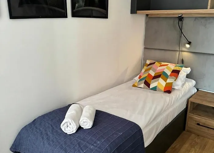 別荘 Cisza Village / Blisko Natury Nowecin