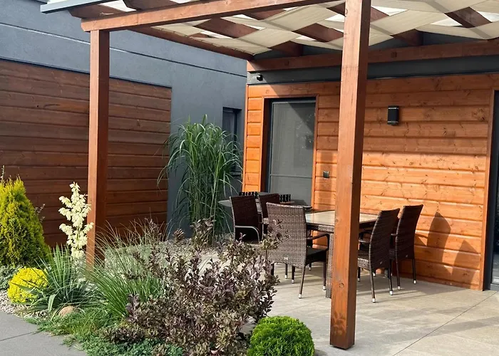 Feriehus Cisza Village / Blisko Natury