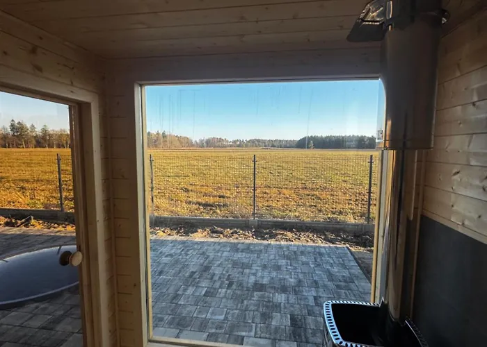 別荘 Cisza Village / Blisko Natury Nowecin